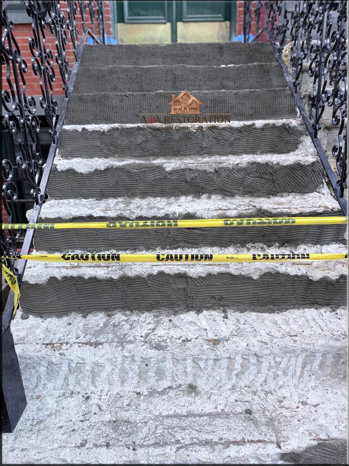 Master mason performing dutchman repair on historic limestone in Cobble Hill Brooklyn during active restoration