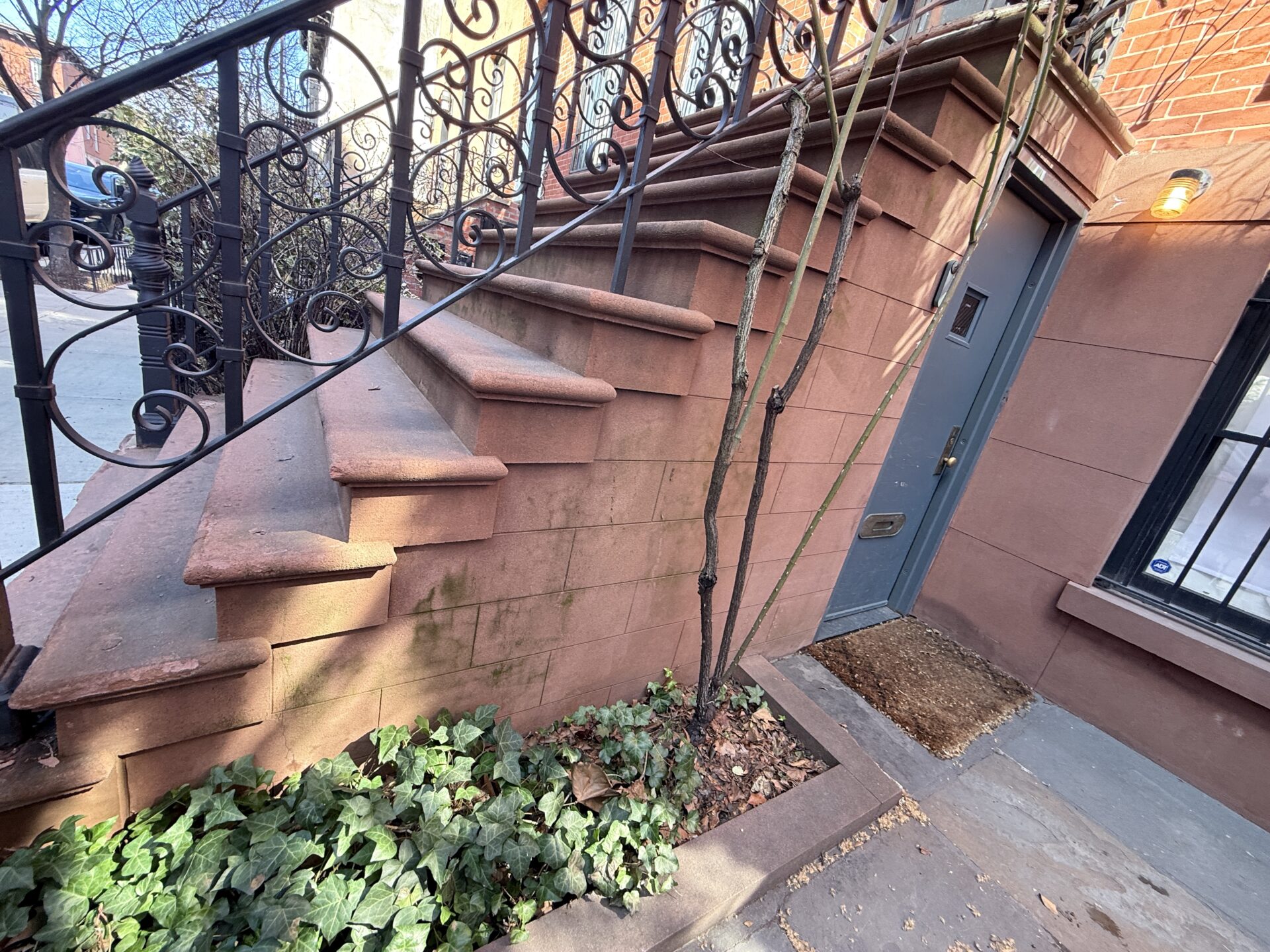 Brownstone facade repair contractor near me