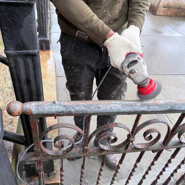 Iron Fence rust scrape and paint in brooklyn Iron Fence rust scrape and paint in brooklyn